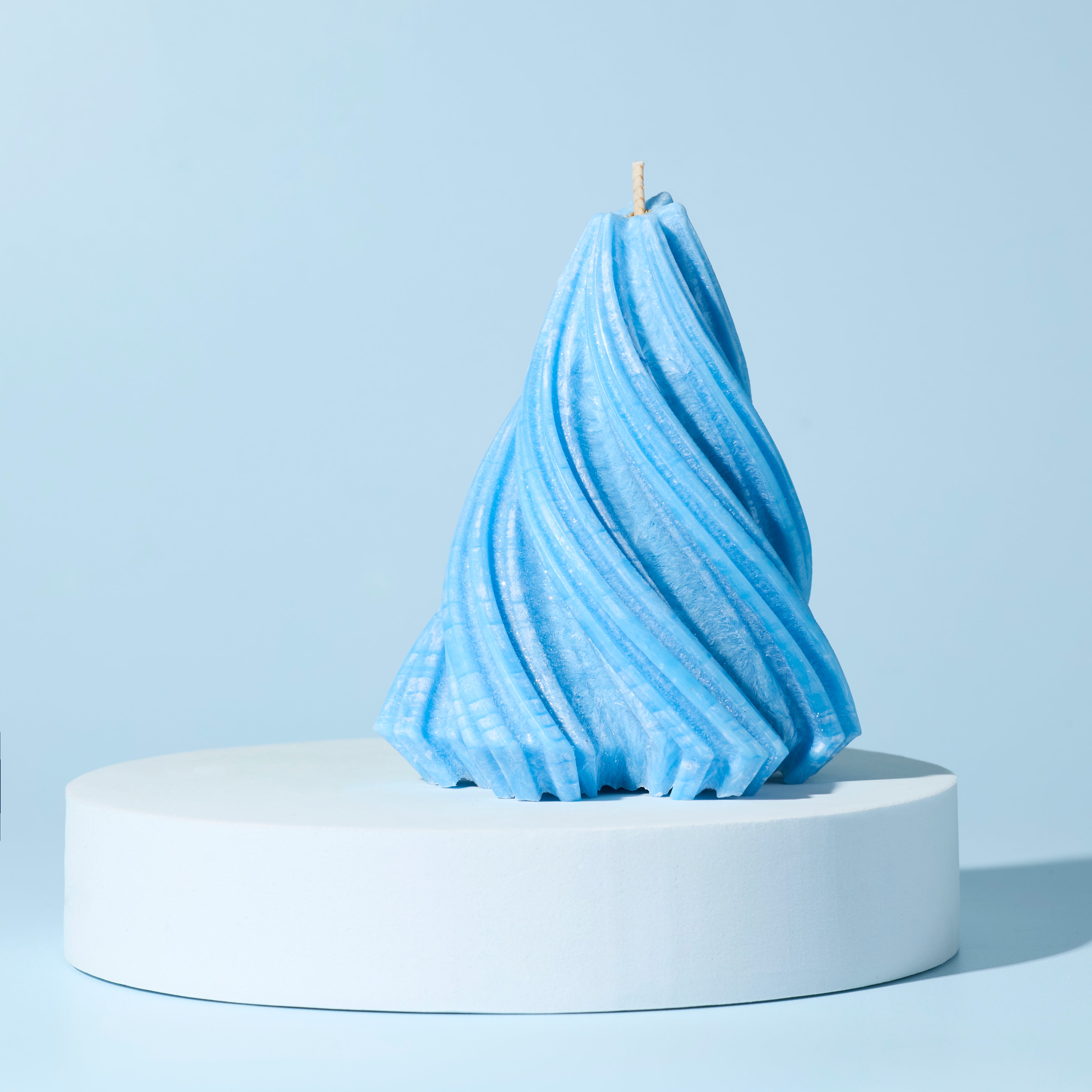 slight blue swirl Christmas tree candle