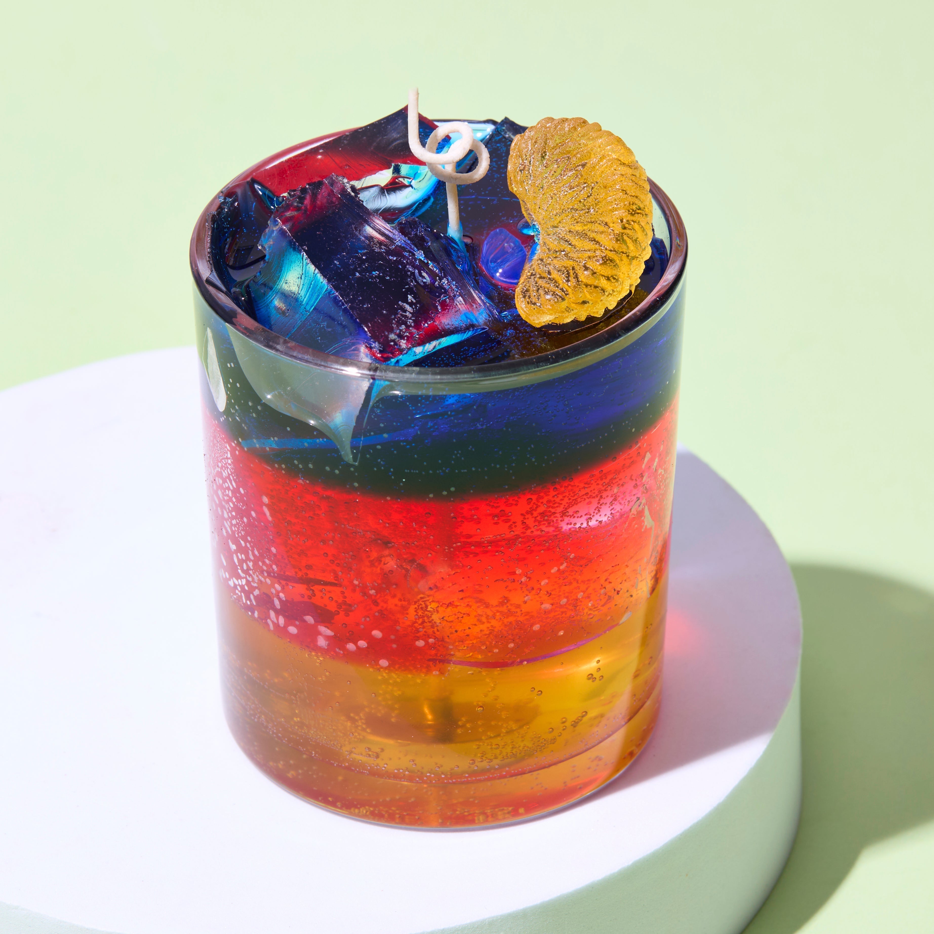 Layered rainbow gel wax candle