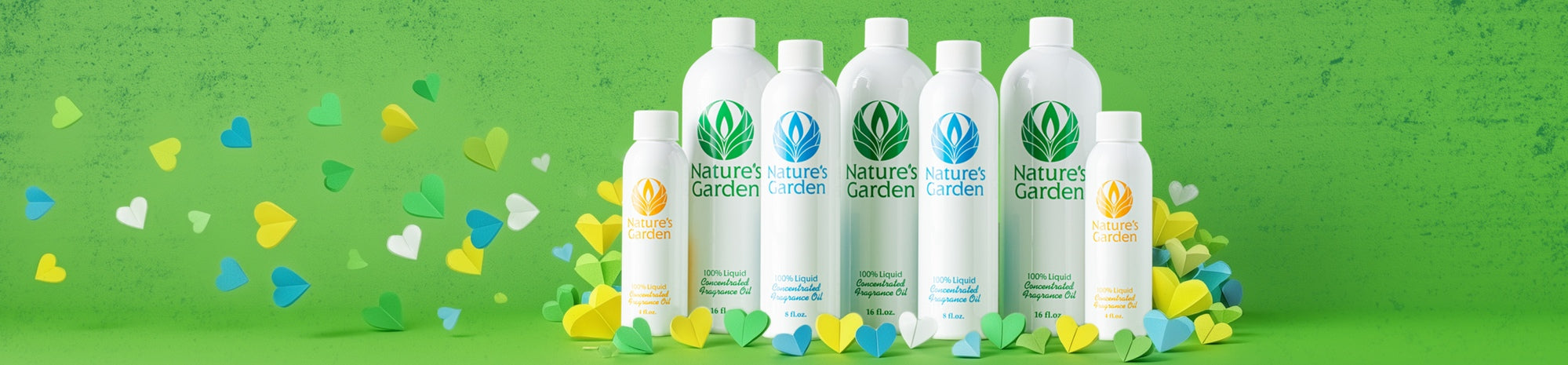 Green Nature’s Garden banner featuring a lineup of white fragrance oil bottles in different sizes, surrounded by colorful paper hearts, with a textured green background and space on the right for promotional text.
