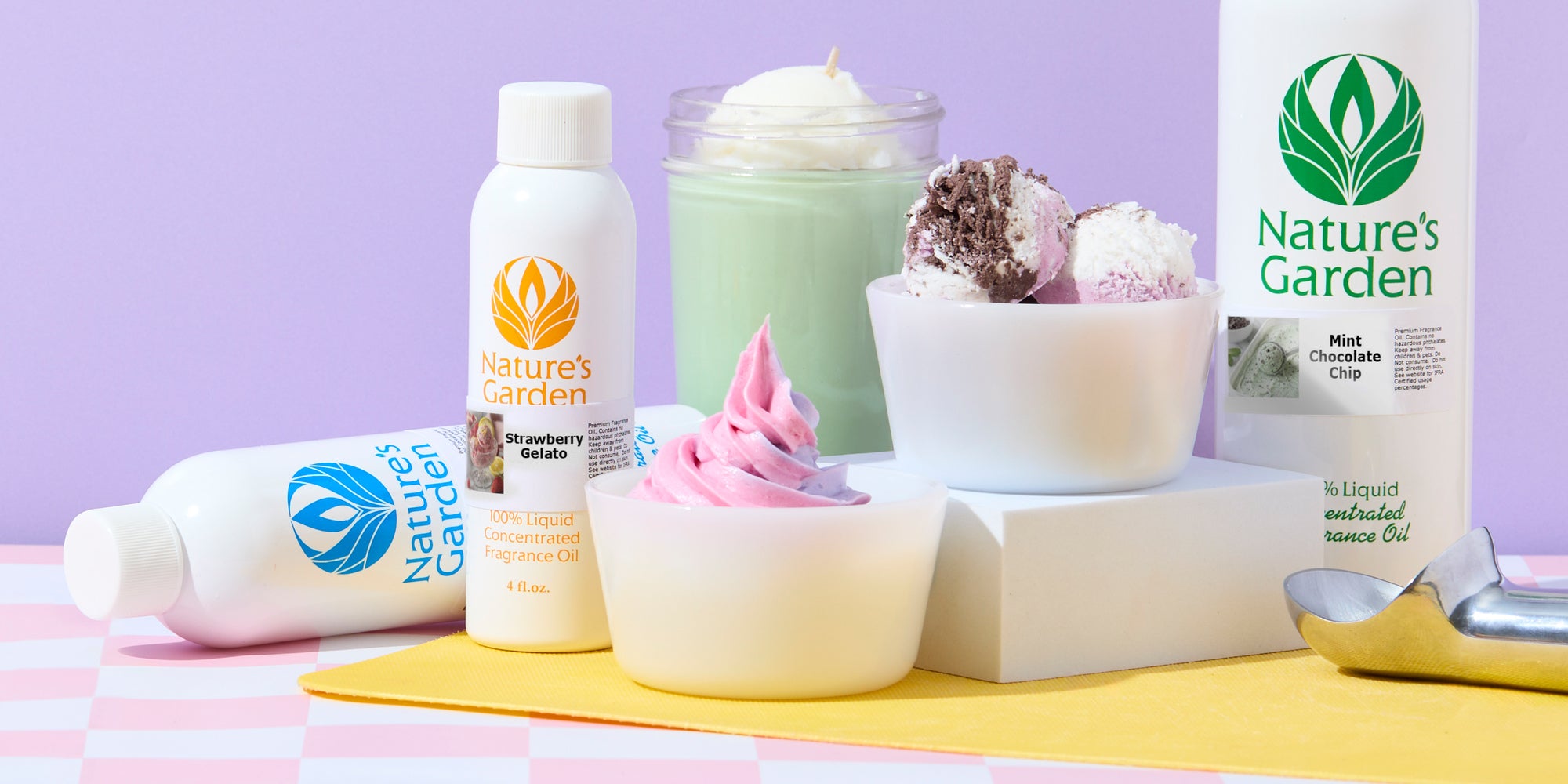 Nature’s Garden fragrance oils displayed with pastel frozen desserts, including strawberry gelato, mint chocolate chip, pink soft-serve, and ice cream scoops, on a pink checkered tabletop with a lavender background.