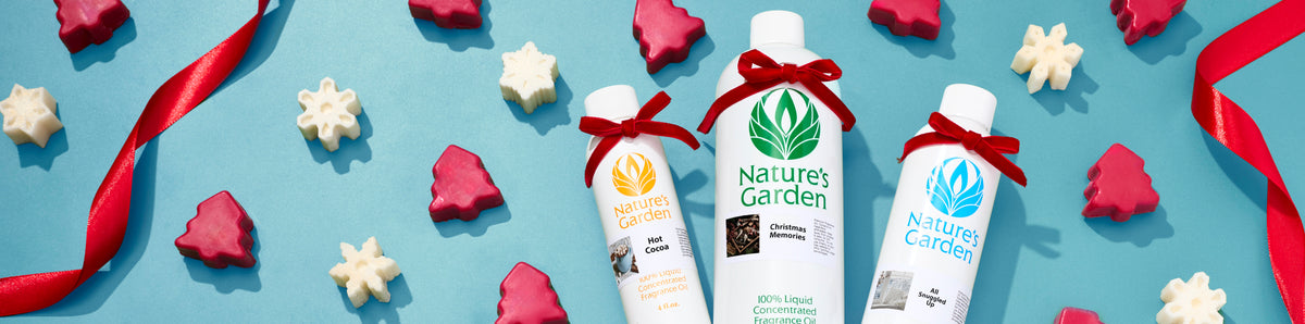 Nature’s Garden holiday fragrance oils tied with red bows, surrounded by red Christmas tree and white snowflake shapes on a blue background with curling red ribbon.